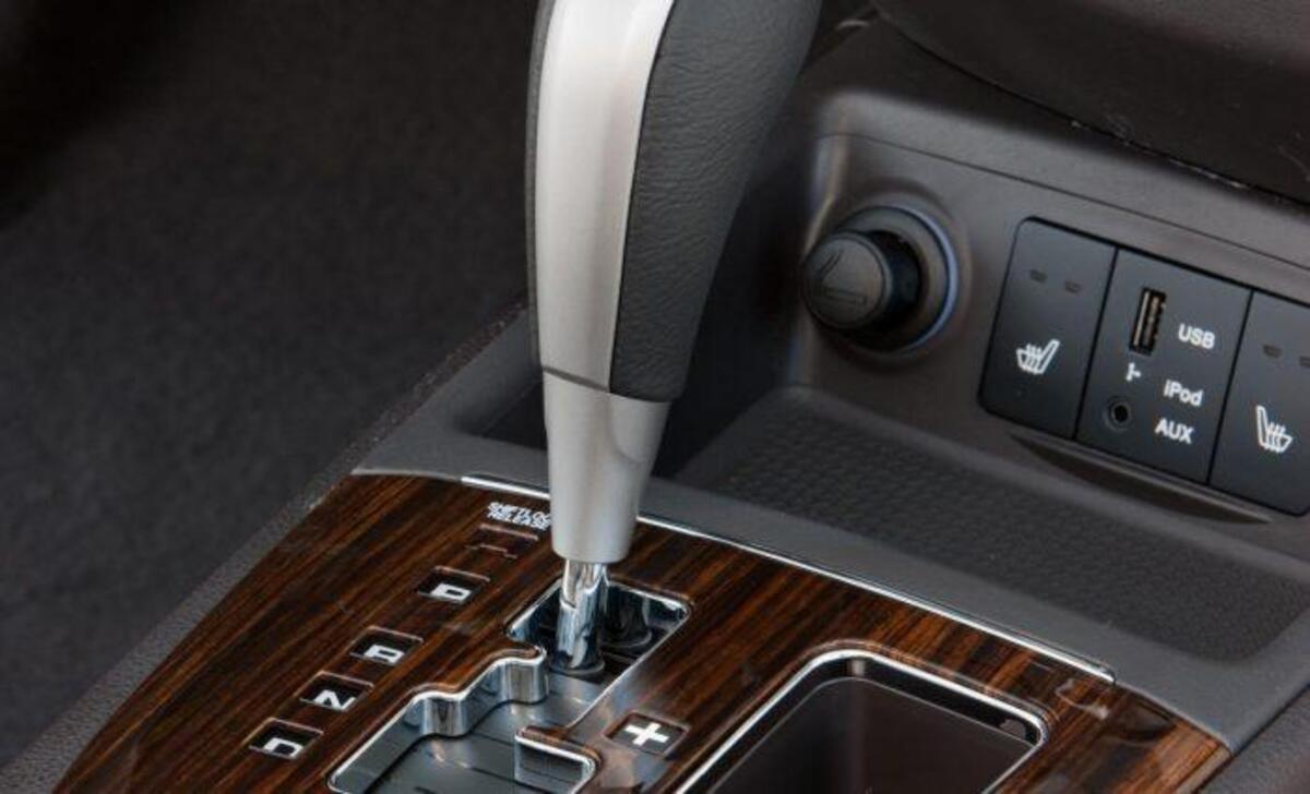 Locate The Gear Lever And The Park Button-Release Mechanism